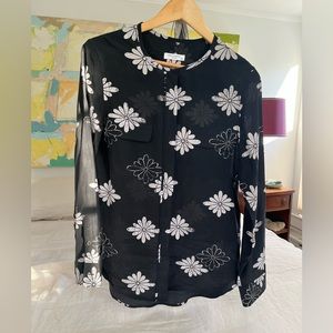 A silk Equipment blouse with a graphic flower print